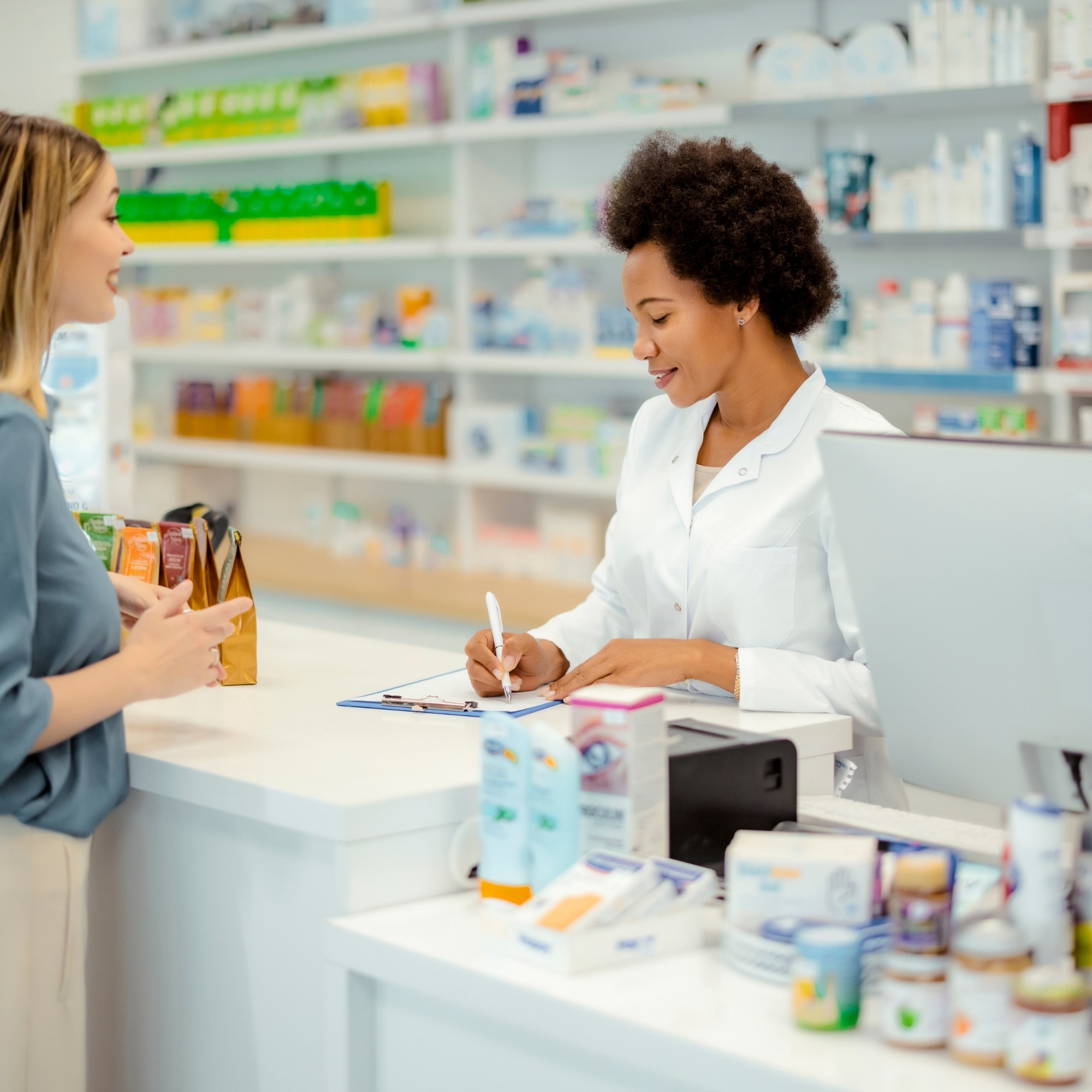 Professional pharmacist providing personalized consultation and healthcare services to customer